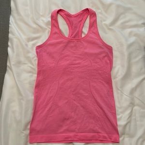 LULULEMON LIPSTICK PINK SWIFTLY TANK. SIZE 2